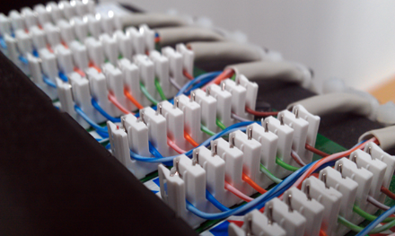 ethernet patch panel cable termination into coms rack in hertfordshire office