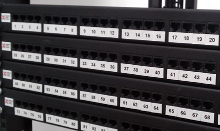 cat6 ethernet patch panel cable termination into coms rack in hertfordshire office