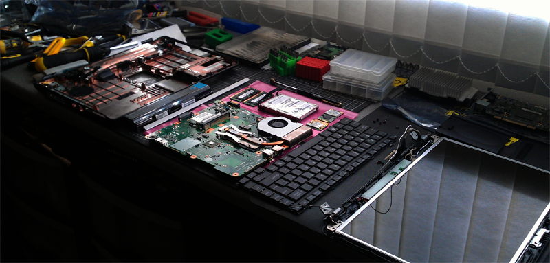 image of a laptop taken apart for repair by a laptop repair shop in stevenage providing laptop screen repair in stevenage hitchin letchworth baldock welwyn hertford hatfield hertfordshire