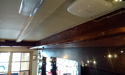 image of a trendnet surface mounted wireless access point installed by flying moth ltd in the olde kings arms pub in hemel hempsted hertfordshire to give wifi internet access to customers